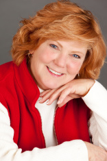 stock-photo-12335249-portrait-of-a-red-headed-mature-woman